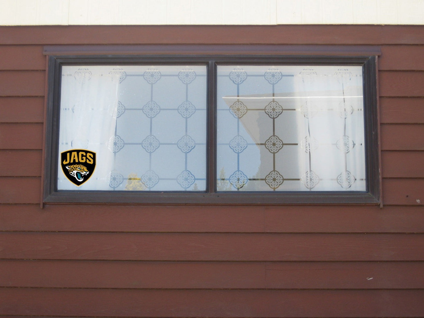 Jacksonville Jaguars Logo Cut Laminated Vinyl Sticker Decal NFL car window