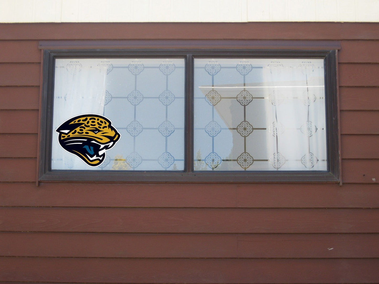 Jacksonville Jaguars Logo Cut Laminated Vinyl Sticker Decal NFL car window